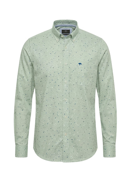 Green patterned shirt on a white background
