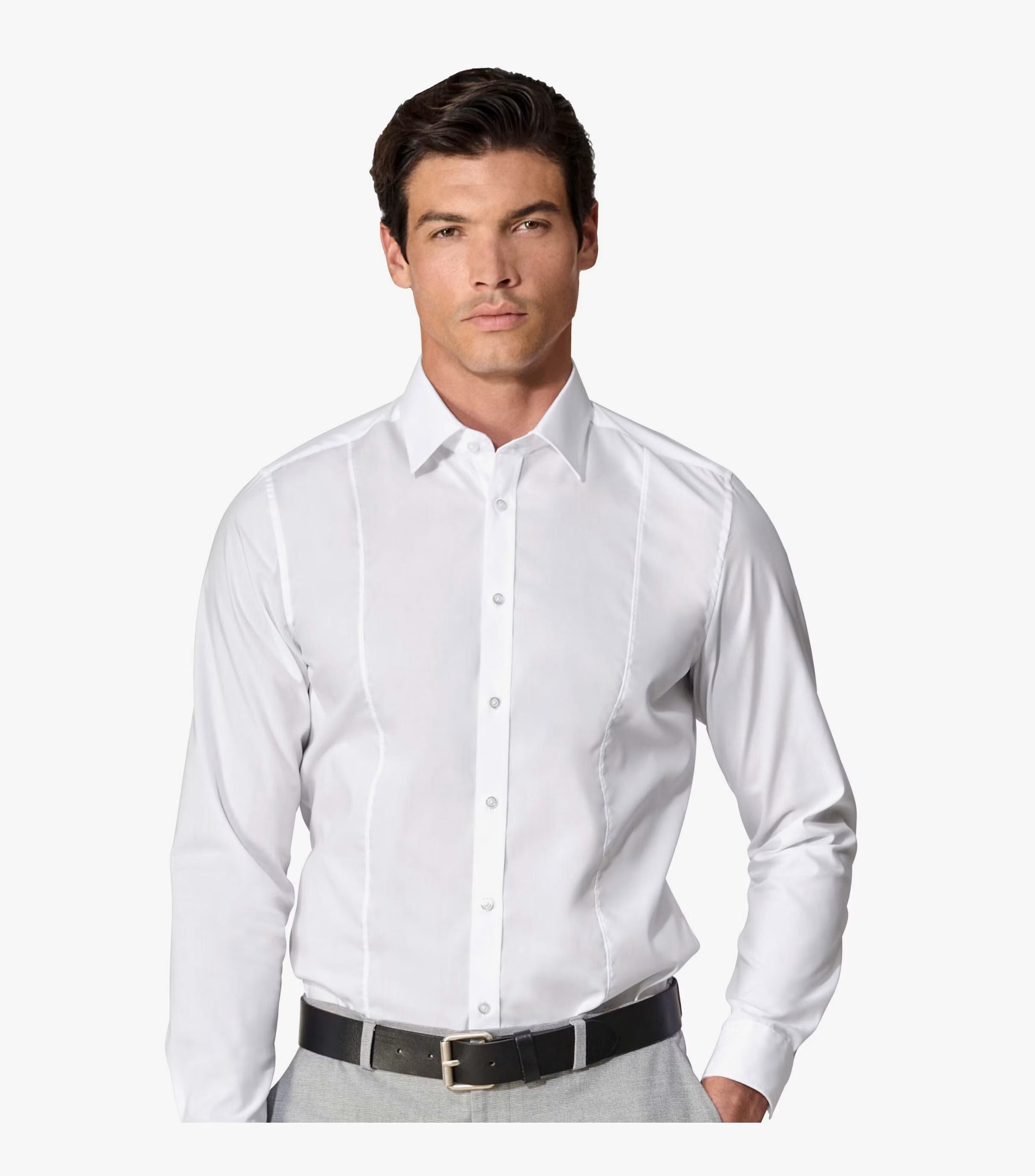 Man wearing a white dress shirt with a black belt on a white background