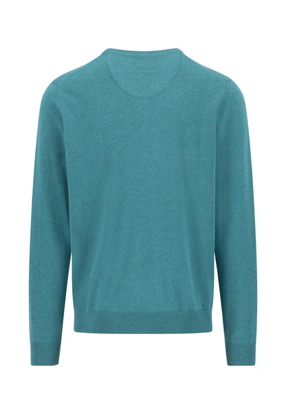 Teal sweater on a white background