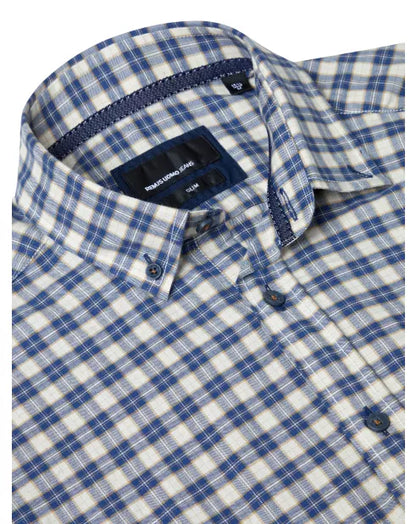 Blue and white checkered shirt with brand label on a white background