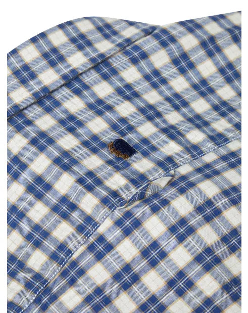Close-up of a blue and white checkered shirt with a button.