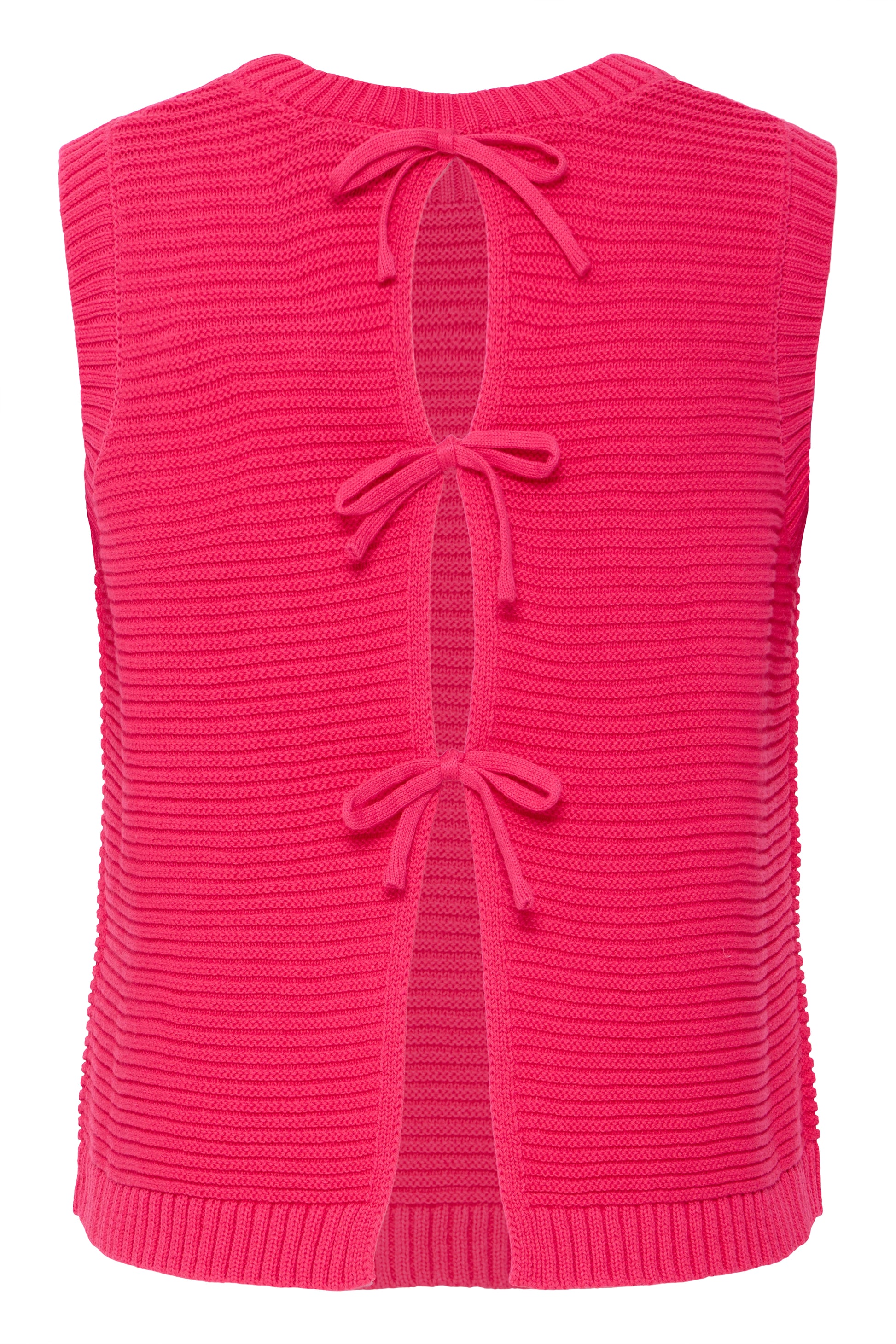 Pink knitted vest with bow details on a white background