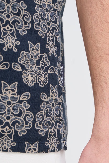 Navy blue fabric with beige floral pattern and 'Cafedelites' label on a white background