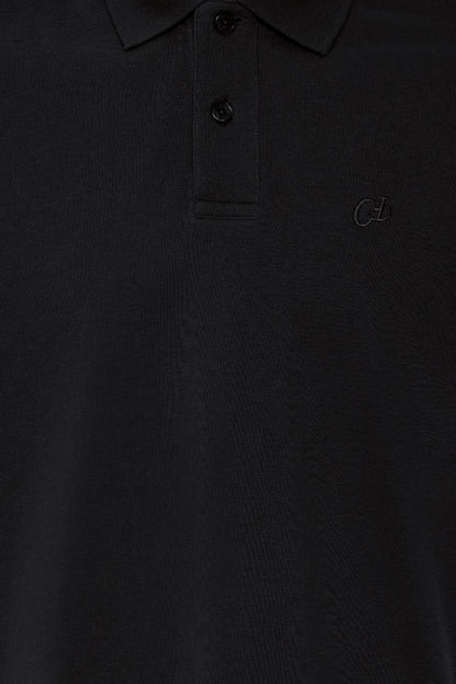 Close-up of a black polo shirt with buttons and a brand logo.
