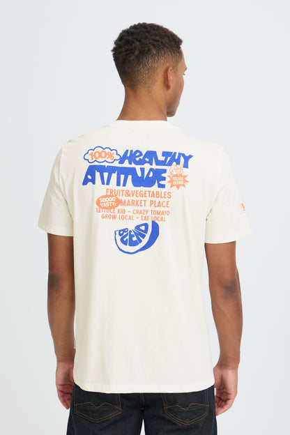 Person wearing a white t-shirt with colorful graphics and text on the back, standing against a plain background.