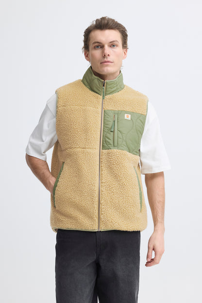 Man wearing a two-tone fleece vest on a white background