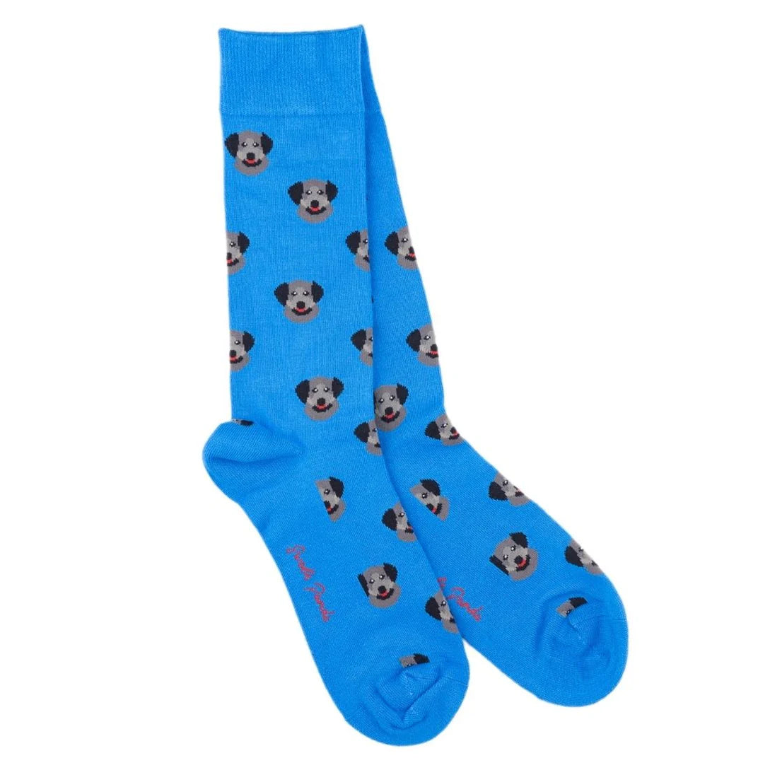 Blue socks with dog pattern on a white background