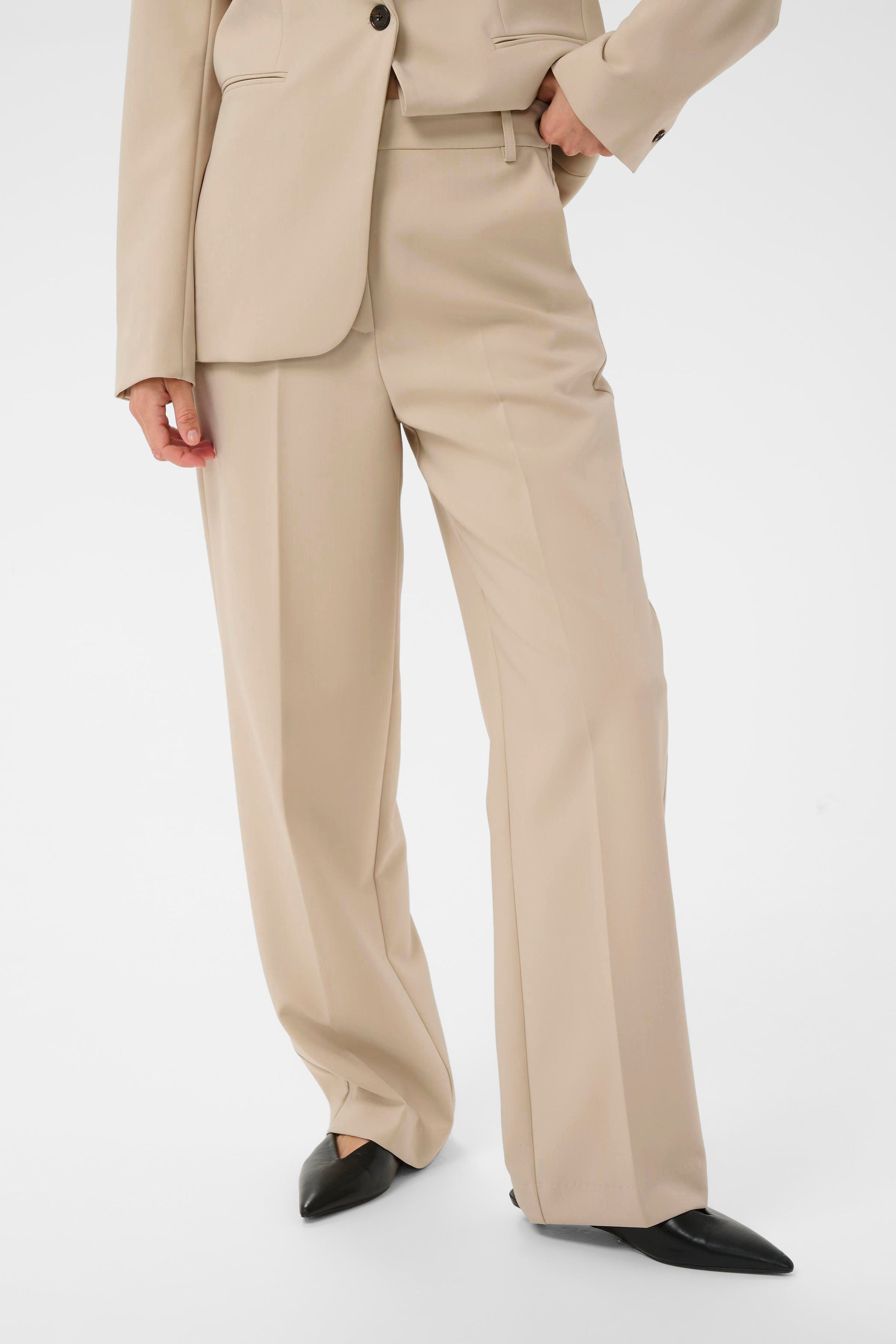 Beige suit with wide-leg pants on a white background