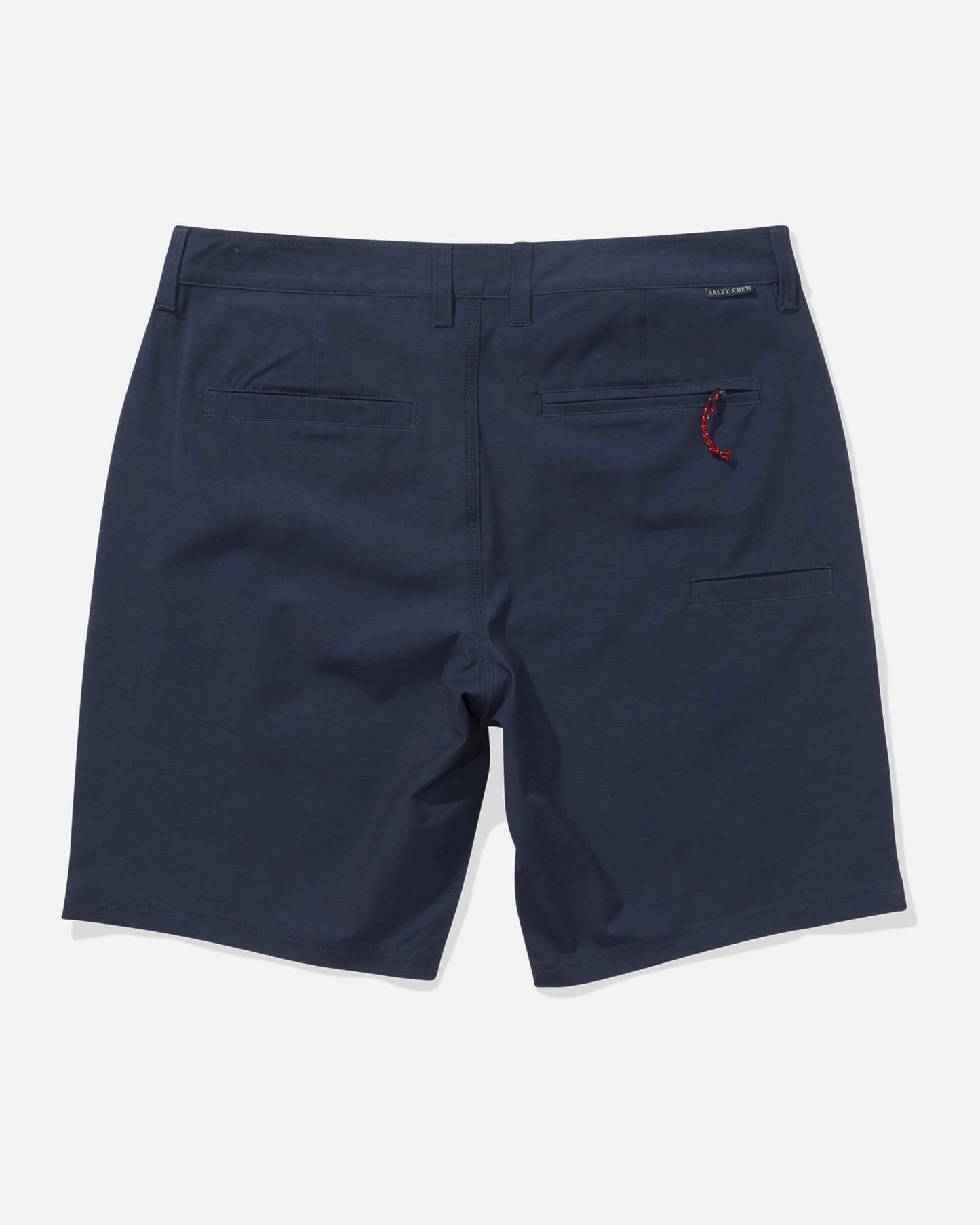 Navy shorts with a red tag on a white background