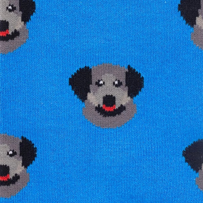 Blue knit fabric with a repeating pattern of stylized gray dog faces with black ears and red tongues.
