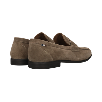 Brown loafers on a white background