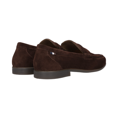 Brown loafers on a white background