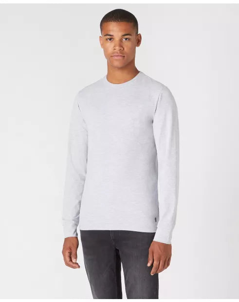 Man wearing a light gray long-sleeve shirt on a white background