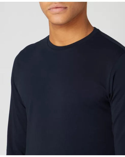 Navy long-sleeve shirt worn by a person on a light gray background