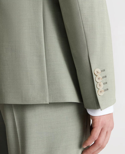 Close-up of a light gray suit with buttons on a white background