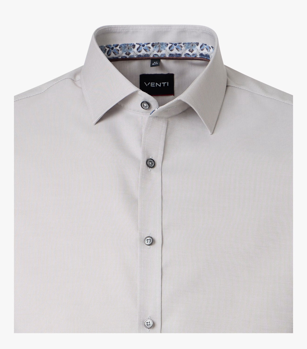A close-up of a light beige Venti brand dress shirt, showing the collar, button-down front, and a patterned inner collar lining.
