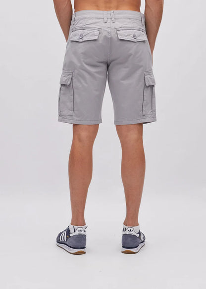 Person wearing gray cargo shorts on a white background