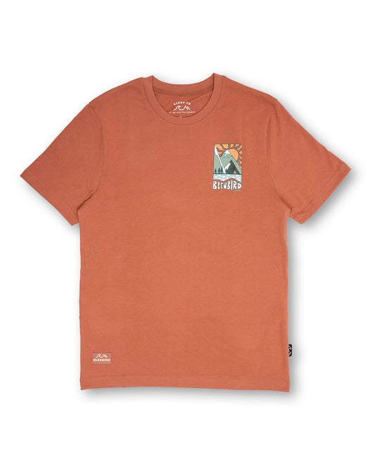 Orange t-shirt with a graphic design on a white background