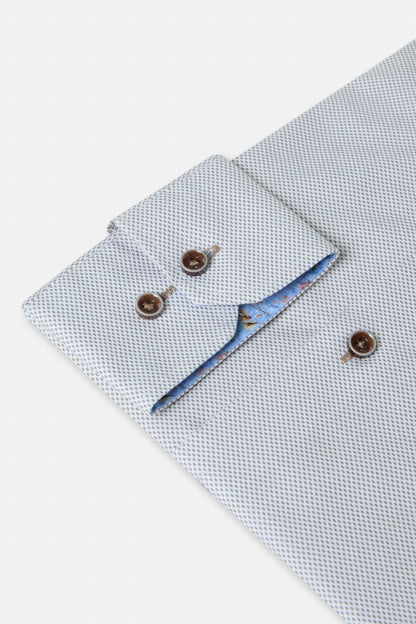 Close-up of a textured shirt with buttons on a white background