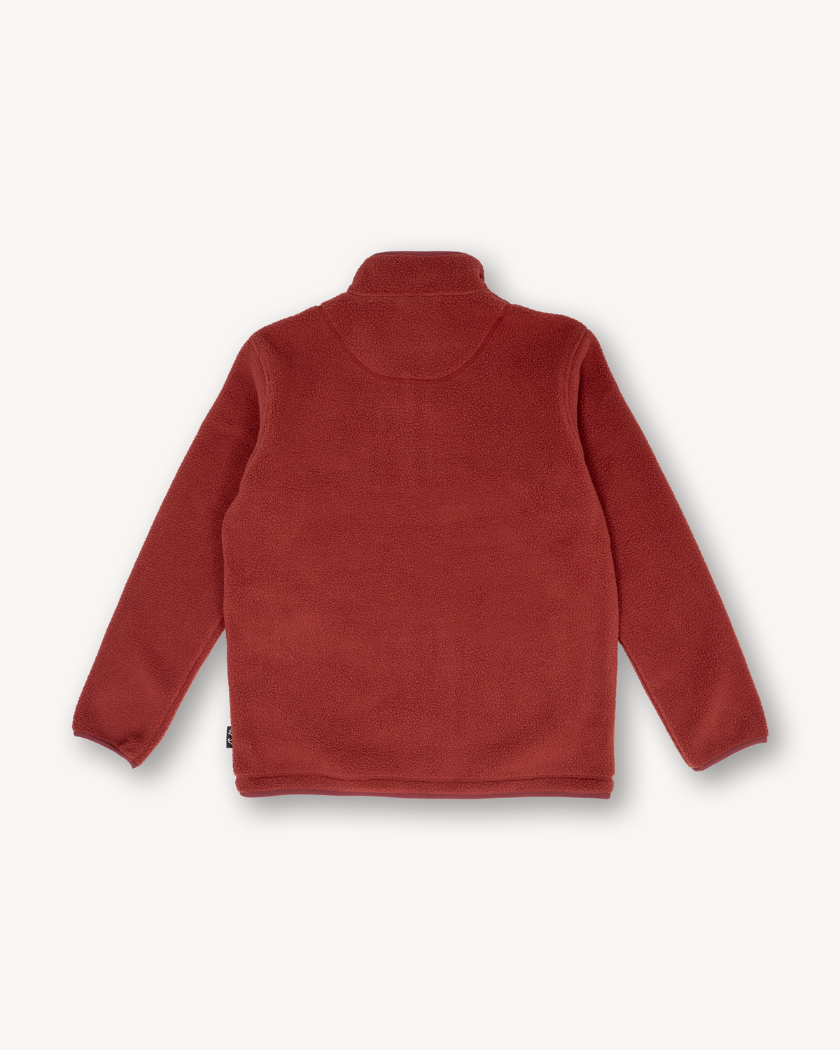 A rust red fleece half-zip sweater shown from the back, featuring a mock neck and long sleeves, laid flat against a light off-white background.