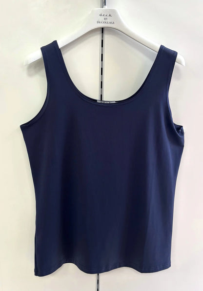 Navy blue tank top on a hanger against a white background