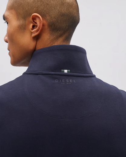 Navy jacket with Diesel logo on a plain background