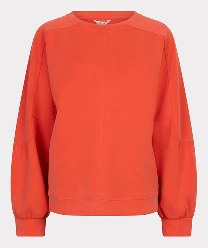 Orange sweatshirt on a light gray background