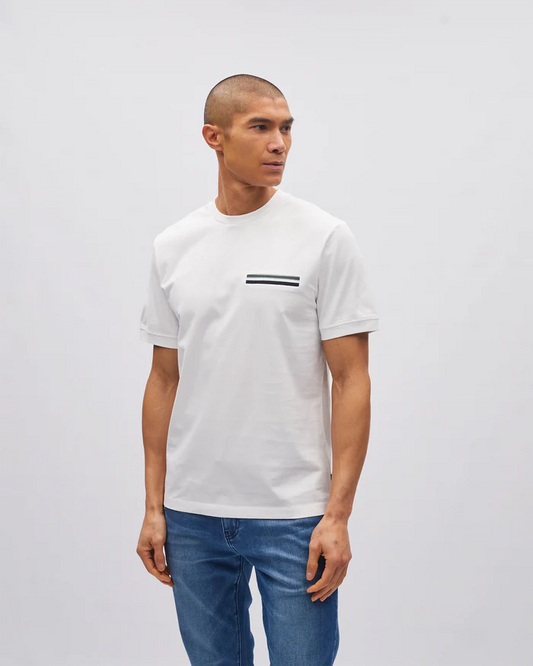 Man wearing a white t-shirt with a black and blue graphic on a plain background