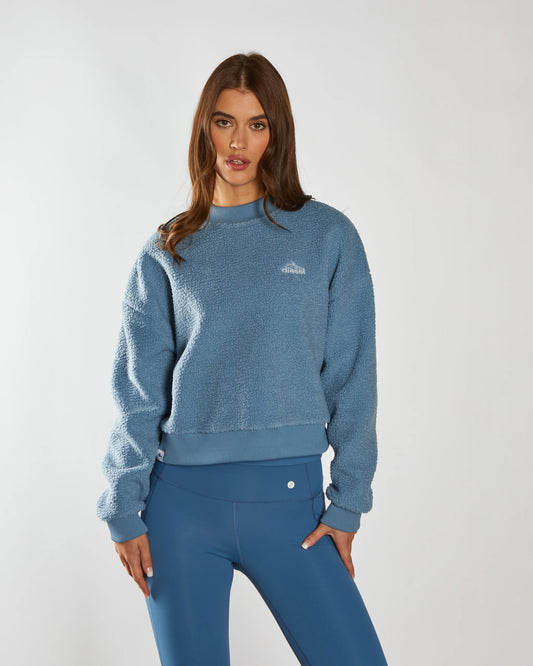 Woman wearing blue fleece