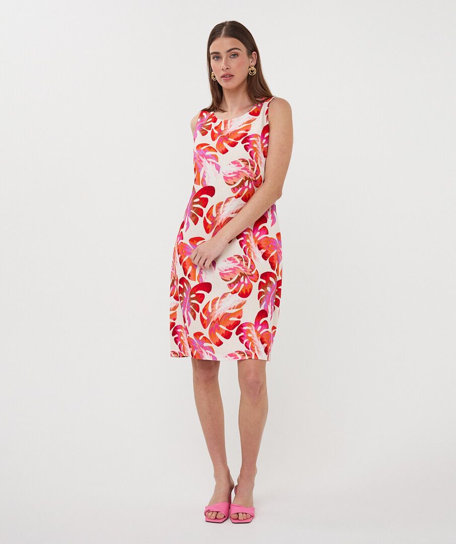 Woman wearing a floral dress on a white background