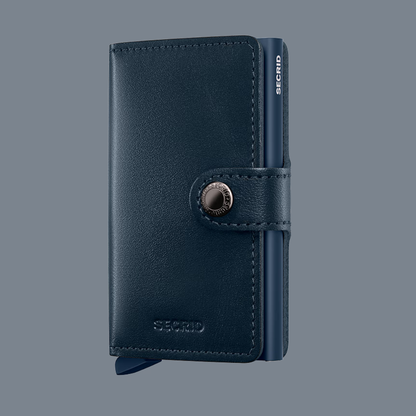 Blue wallet with brand logo on a gray background