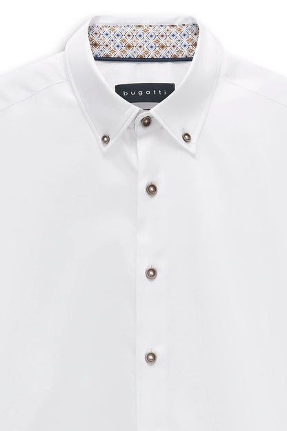 A close-up of a white Bugatti button-down shirt with distinctive metallic buttons and a patterned inner collar lining.
